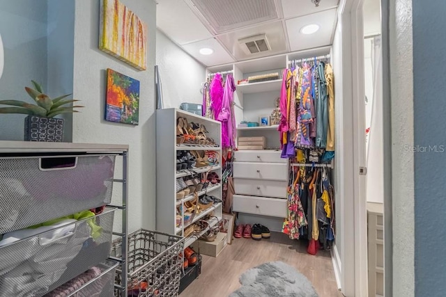 151 E Washington St Unit 201, Orlando, FL 32801 - walk in closet with wood finished floors