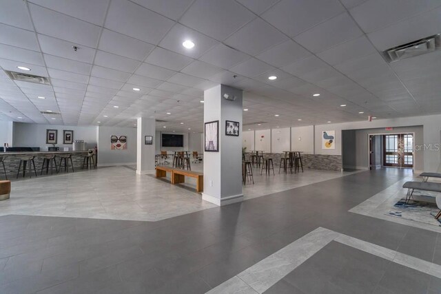 151 E Washington St Unit 201, Orlando, FL 32801 - building lobby with a paneled ceiling and recessed lighting
