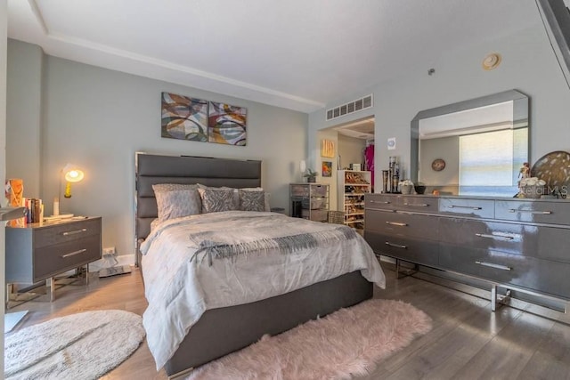 bedroom featuring light hardwood / wood-style floors