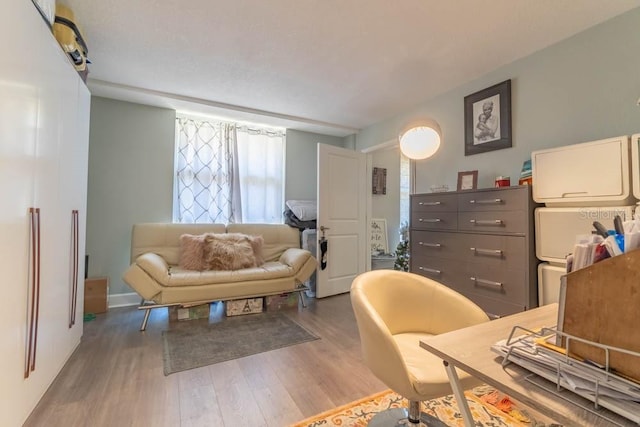 151 E Washington St Unit 201, Orlando, FL 32801 - living room with wood finished floors
