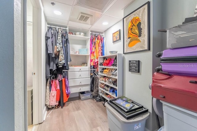 walk in closet featuring light wood-type flooring