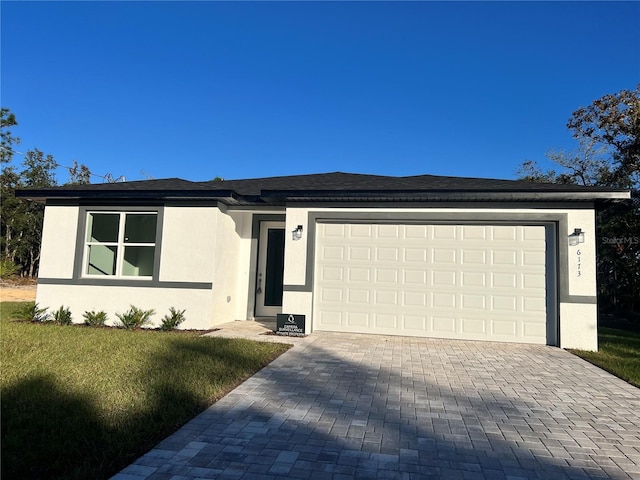 view of front of home with a garage