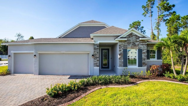 view of front of property with a garage