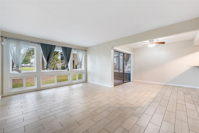 empty room featuring ceiling fan