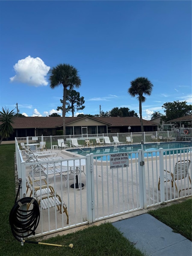 view of swimming pool featuring a patio