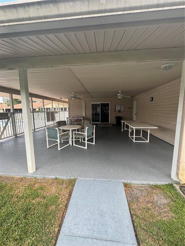 view of patio featuring ceiling fan