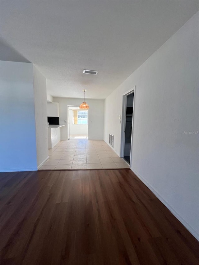 corridor featuring light hardwood / wood-style flooring