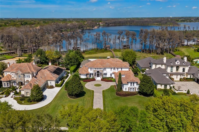 birds eye view of property featuring a water view