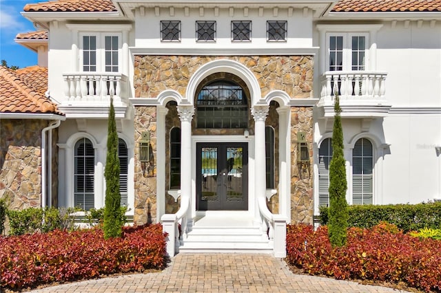 view of exterior entry with french doors