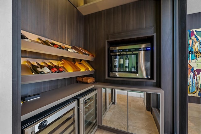 wine room with bar and wine cooler