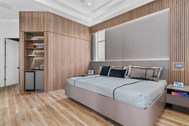 bedroom with light hardwood / wood-style floors