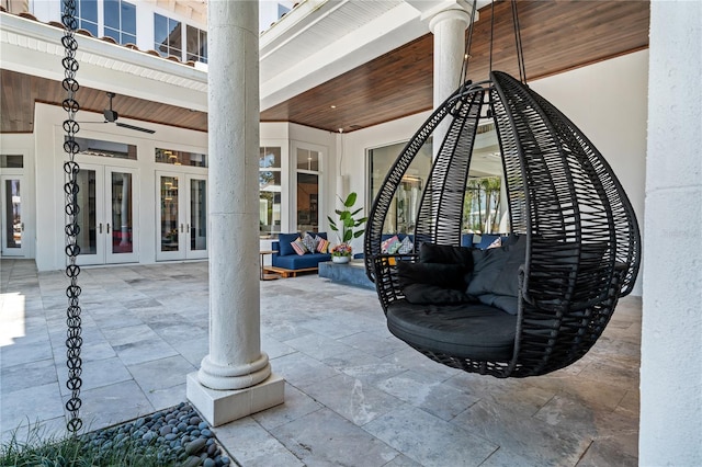 view of patio with ceiling fan and french doors