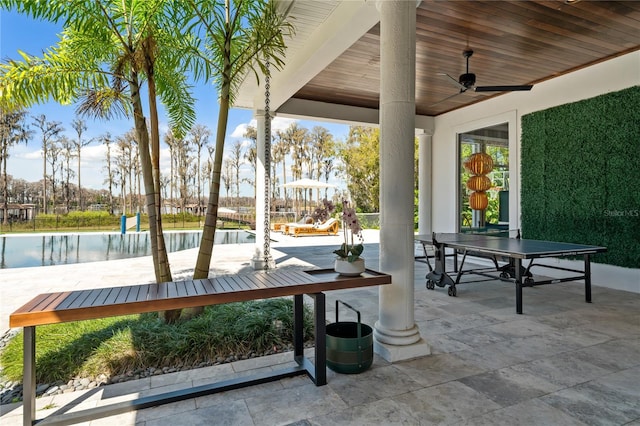 view of patio / terrace featuring ceiling fan