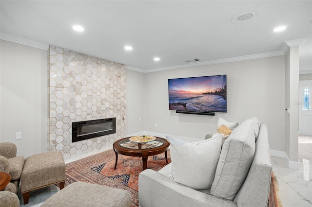 living room featuring ornamental molding and a fireplace