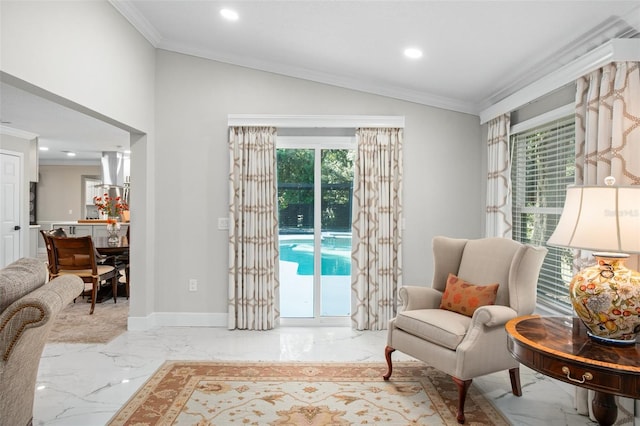 living area with vaulted ceiling and crown molding