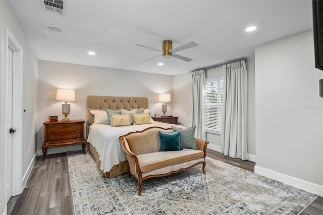 bedroom featuring ceiling fan and wood-type flooring