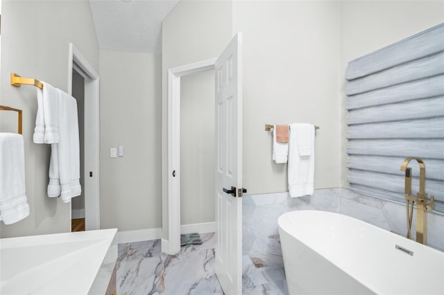 bathroom with tile walls and a tub