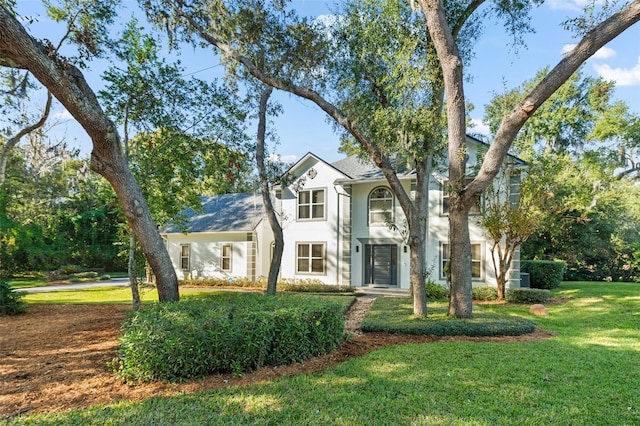 view of front of house with a front yard