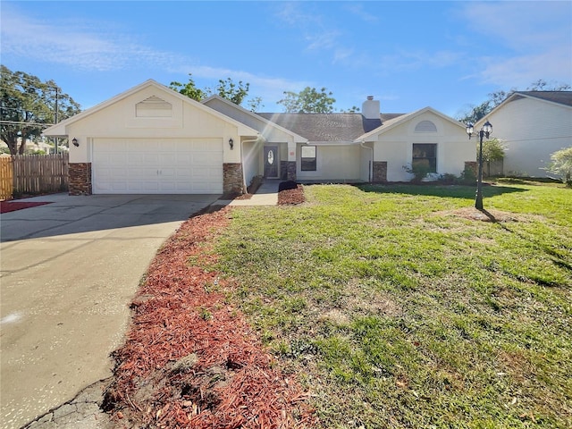 single story home with a front lawn and a garage