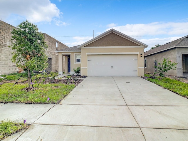 single story home featuring a garage