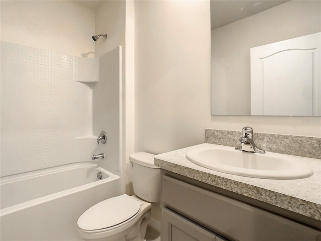 full bathroom featuring vanity,  shower combination, and toilet