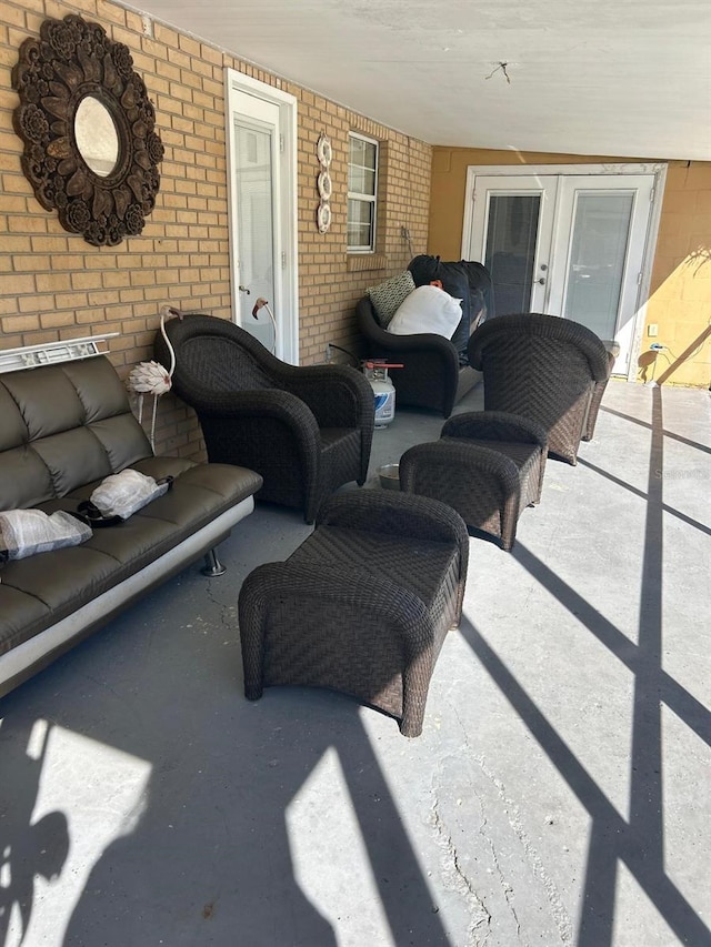 view of patio / terrace featuring french doors and an outdoor living space