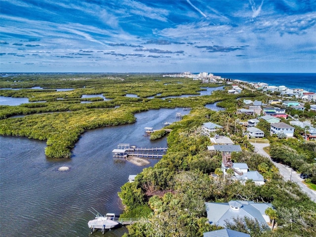 drone / aerial view featuring a water view