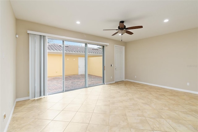 spare room with ceiling fan