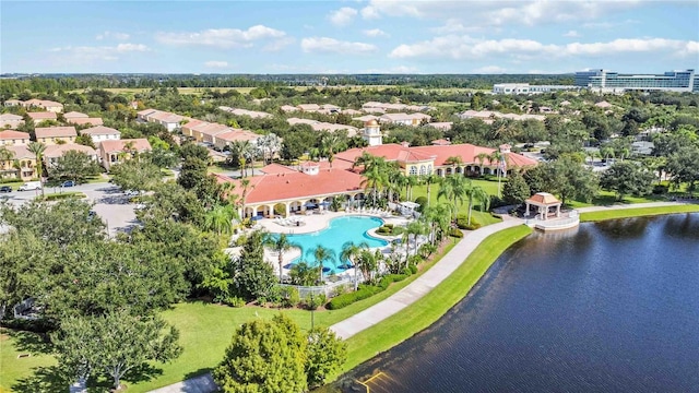 birds eye view of property featuring a water view