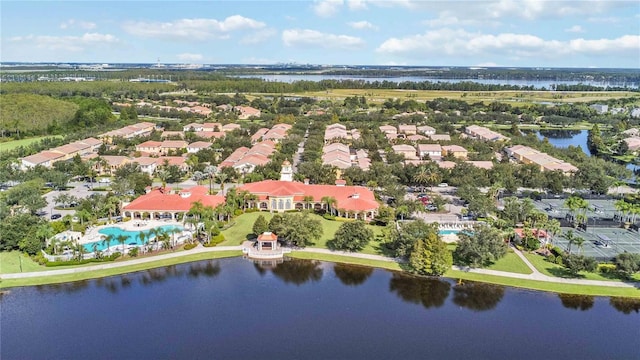 birds eye view of property featuring a water view