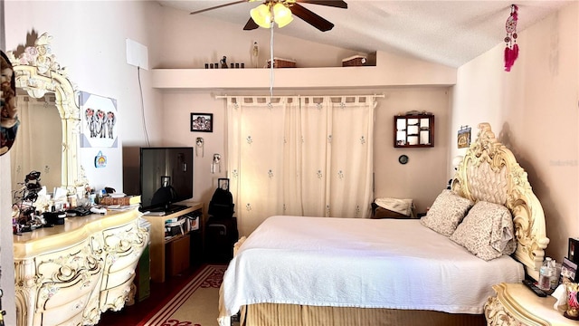 bedroom with ceiling fan and lofted ceiling