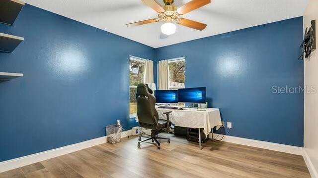 office area featuring ceiling fan and hardwood / wood-style floors