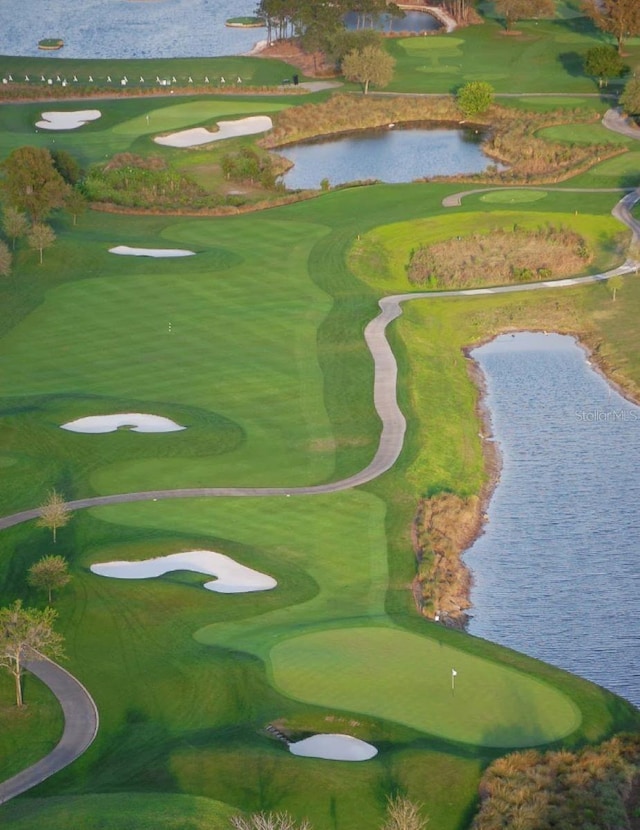 513 Mirasol Cir Unit 101, Celebration, FL 34747 - surrounding community featuring a water view and golf course view