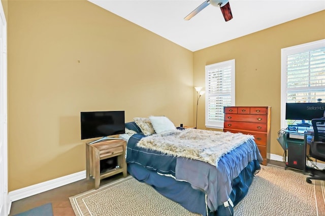 bedroom featuring ceiling fan