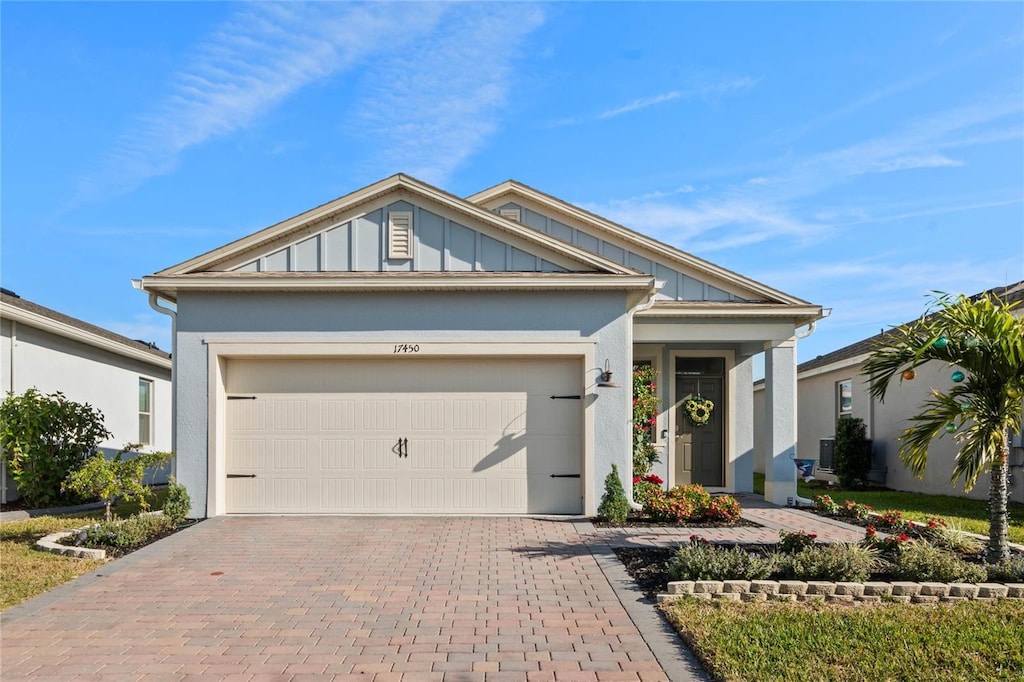 view of front of property with a garage