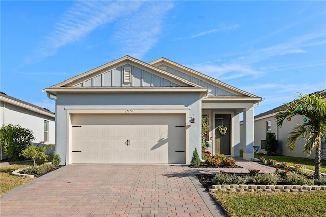 view of front of property with a garage