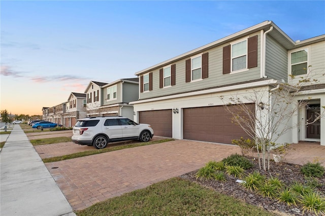 view of front of home with a garage