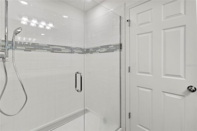 bathroom featuring walk in shower