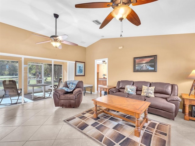 tiled living room featuring vaulted ceiling