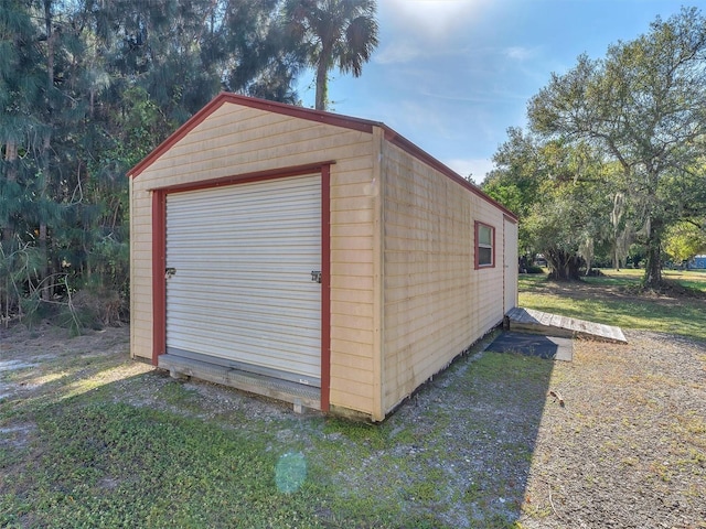 view of outbuilding featuring a garage