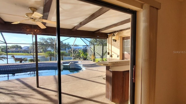 view of pool featuring an in ground hot tub, a water view, and ceiling fan