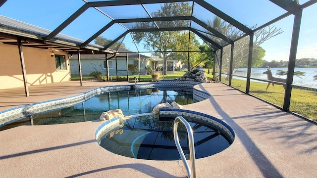 view of pool with glass enclosure, an in ground hot tub, a water view, and a patio