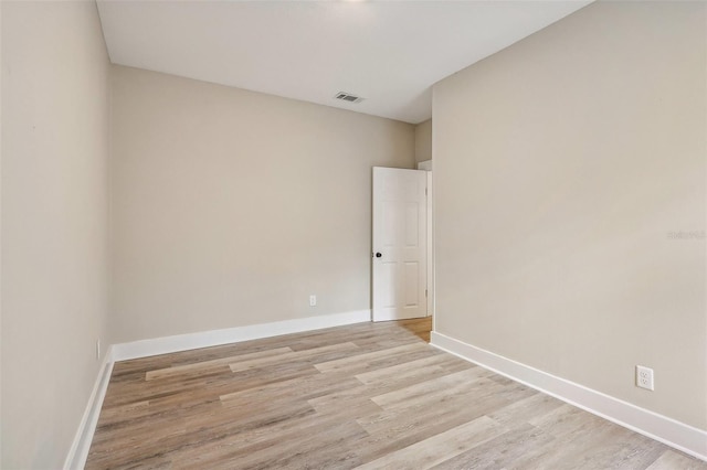 empty room featuring light hardwood / wood-style floors