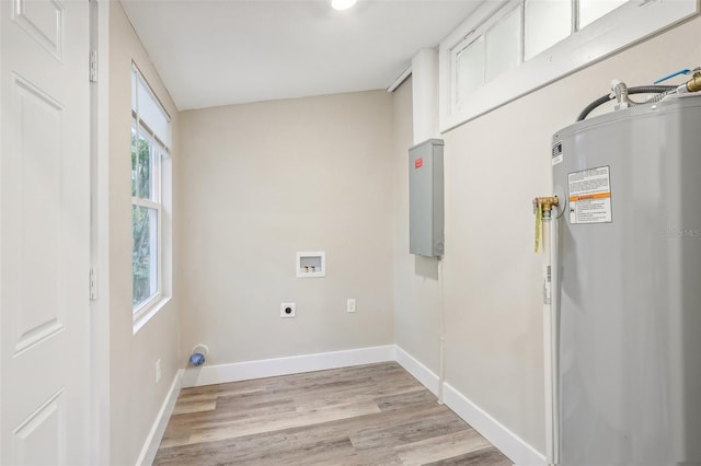 washroom with electric dryer hookup, hookup for a washing machine, light hardwood / wood-style floors, and gas water heater