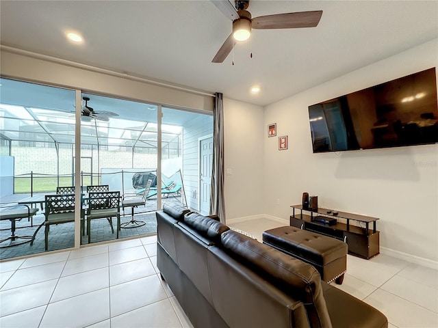 living room with light tile patterned floors and ceiling fan