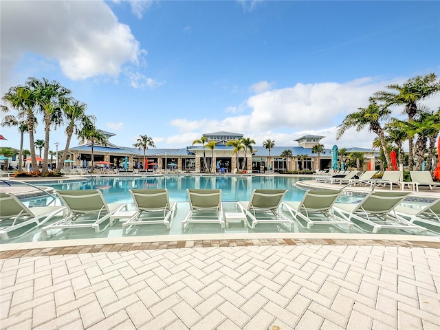 826 Paradise Dr, Davenport, FL 33897 - community pool featuring a gazebo and a patio area