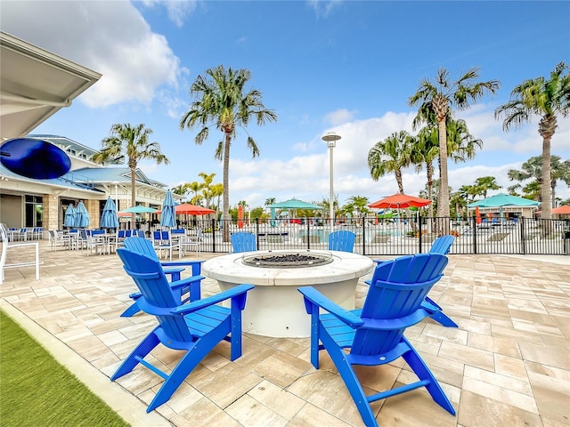 view of patio with an outdoor fire pit