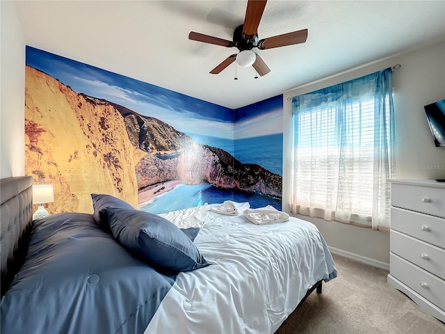 826 Paradise Dr, Davenport, FL 33897 - bedroom with baseboards, carpet floors, and ceiling fan