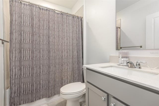 bathroom with a shower with shower curtain, vanity, toilet, and tile patterned flooring