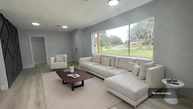 living room with tile walls